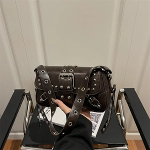 Chic dark brown faux leather shoulder bag with silver rivets and punk style belt buckle