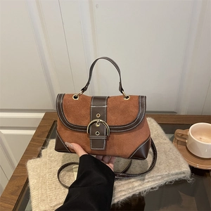 Retro caramel suede and brown leather crossbody bag with decorative metal buckle and handle