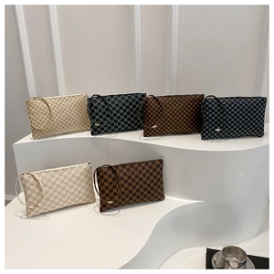 Detail shot of stylish printed pouches with metal ring handles in six various colors