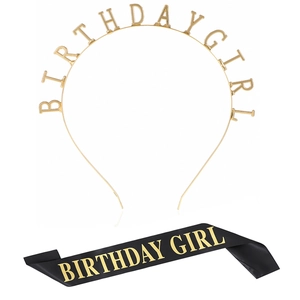Close-up of gold Birthday Girl headband and black satin sash with gold lettering set