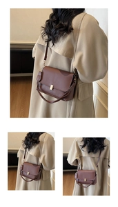 Detail of dark brown vintage crossbody bag with matte PU texture and metal buckle clasp