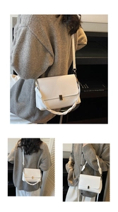 Detail of white crossbody bag with golden metal buckle and woven handle features