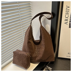 Detail of vintage matte brown leopard print tote bag set with matching inner pouch