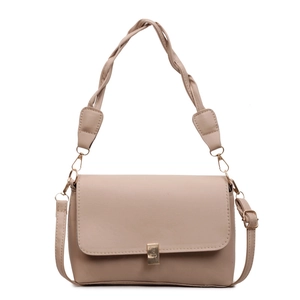Minimalist beige crossbody bag with woven handle and gold buckle on white background