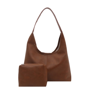 Brown vintage faux leather tote bag and matching pouch set with classic retro texture