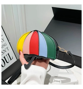 Detailed view of umbrella-shaped crossbody bag with vibrant multicolor leather panels