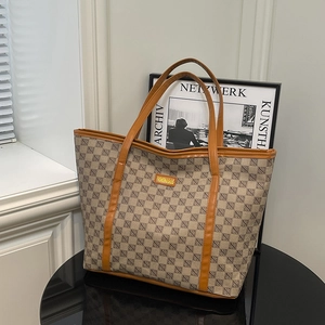 Chic khaki geometric tote bag with brown faux leather straps for daily commute