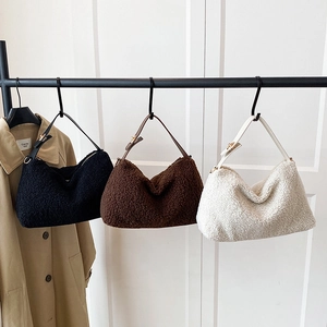 Minimalist faux shearling hobo bags for women in black, brown, and cream colors