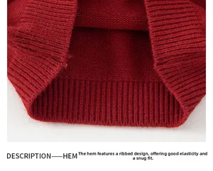 Close-up of red knit sweater ribbed hem showing high elasticity and detailed texture