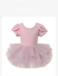 Pink girls ballet leotard dress with ruffled sleeves and sparkling rhinestone details