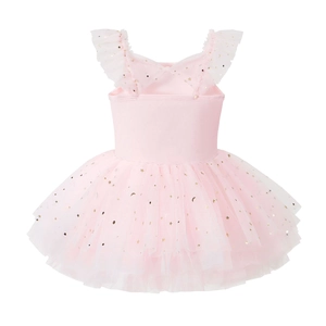 Detail of pink ballet tutu showing gold foil star and moon patterns on ruffled mesh
