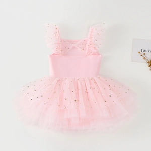 Detailed view of pink girls ballet tutu with golden star and moon sequin embroidery