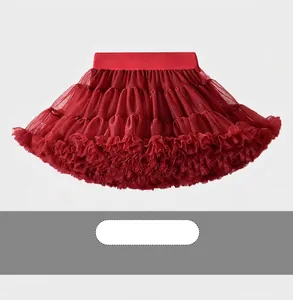 Detail of red tiered tulle tutu skirt with elastic waistband and ultra-fluffy layered design