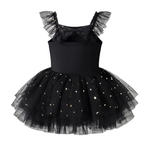 Close-up of girls' black ballet tutu with gold sequin moon and stars and back bow detail