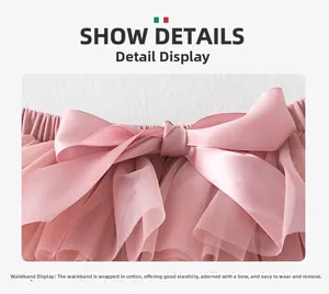 Detail of pink tutu skirt waistband with elastic pleats and satin bow decoration