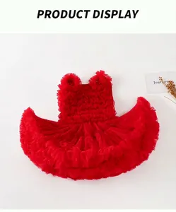 Detail of red tiered tulle dress with sequins and ruffles for girls special occasions