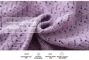 Close-up of light purple baby knitwear featuring breathable hollow pointelle texture