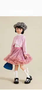Pink girls tutu skirt paired with a California logo hoodie for a layered stylish look