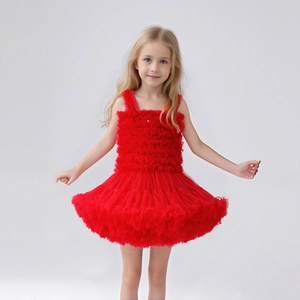 Detail showing the layered ruffles and voluminous mesh texture of the girls' red party dress