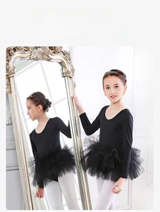 Detail of a black long-sleeve ballet leotard with a layered tutu skirt for young girls