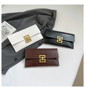 Three stylish crocodile texture envelope clutches in white, black and brown with gold buckle