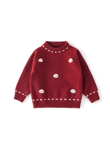 Girls red knit sweater with 3D mushroom accents and white jacquard trim details