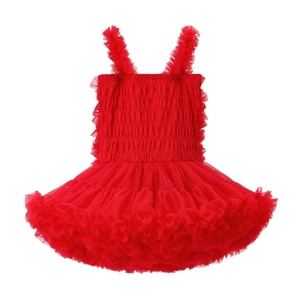 Detail of red tutu dress featuring layered mesh skirt and ruffled shoulder straps