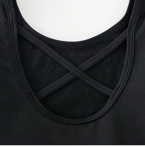 Détail du dos croisé d'un justaucorps de ballet noir pour filles en tissu élastique