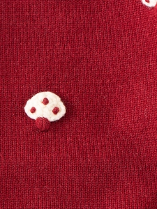 Red girls' knit sweater featuring 3D white mushroom embroidery and soft texture