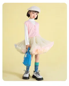 Detail of multi-layered pastel gradient tutu skirt with soft mesh fabric for girls