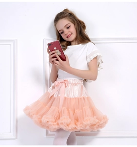 Detail of girl's tutu skirt featuring multi-layer mesh and soft satin waist bow