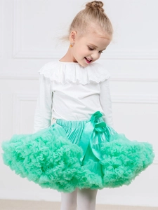 Girls mint green tutu skirt with layered mesh tulle and satin bow on white background