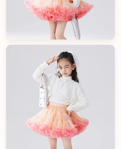 Detailed view of layered gradient pink tulle skirt for girls with a matching handbag