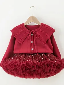 Red knit cardigan with ruffled collar and matching gold star tulle tutu skirt set