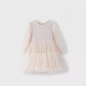 Detailed view of layered tulle skirt and delicate lace sleeves on a girls dress