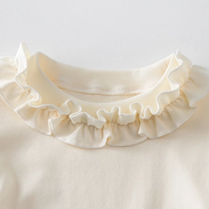 Girls' cream white ruffle collar top with puff sleeves and ribbed cotton knit fabric