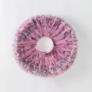 Pink layered tulle Tutu skirt for girls with green leaf patterns shown in top view layout