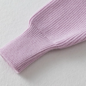 Detailed macro view of light purple ribbed knit sleeves with elastic ribbed cuffs