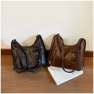 Détails des grands sacs fourre-tout vintage en cuir marron café et marron caramel