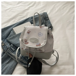 Detail of cute bear and rabbit prints on a gray-white college style mini backpack