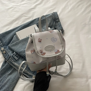 Mini cute cartoon print backpack in light grey and white with bear and rabbit patterns