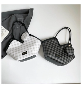 Top view of checkered bucket tote bags with V-shaped opening and matching coin pouches