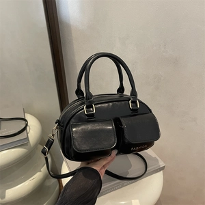 Retro black faux leather pillow bag with double pockets and adjustable shoulder strap