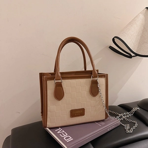 Chic cream checkered shoulder bag with brown trim and metallic chain strap for women