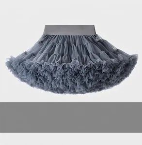 Detailed view of multi-layered dark grey tutu skirt with elastic waistband and soft mesh