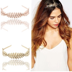 Detailed view of Greek style laurel leaf headband in gold and rose gold metallic finish