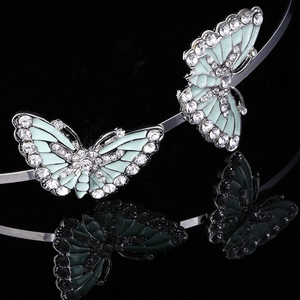 Cerchietto argento con due farfalle in smalto verde chiaro e strass scintillanti