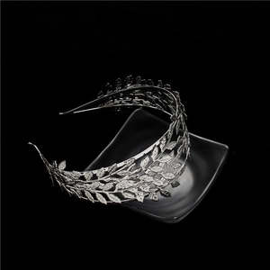 Detailed view of the layered silver alloy leaf patterns on this Greek goddess headpiece
