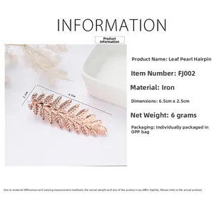Detailed view of leaf-shaped pearl hair clip with 6.5cm x 2.5cm size specifications