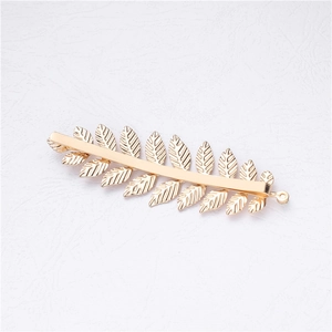 Barrette à cheveux dorée avec cristaux et motifs de feuilles pour coiffure de mariée